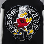 Black varsity jacket back graphic with cartoon eagle and colorful patch