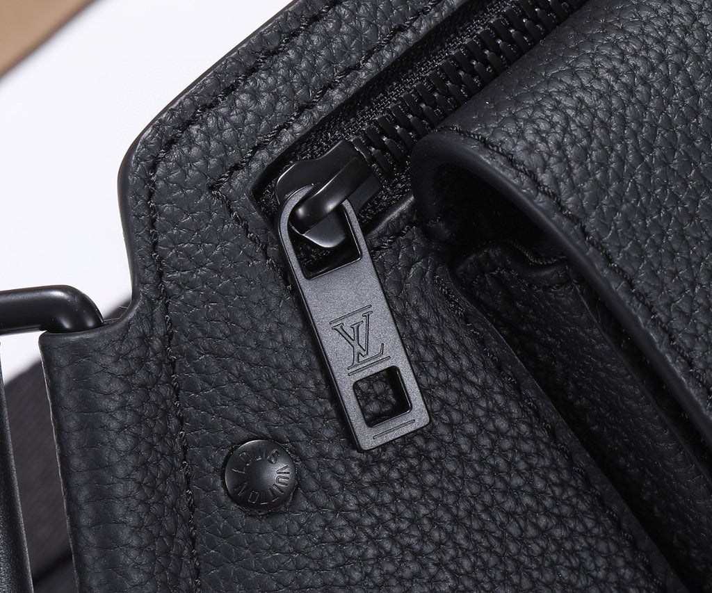 Black leather belt bag strap with metal buckle and LV logo tag