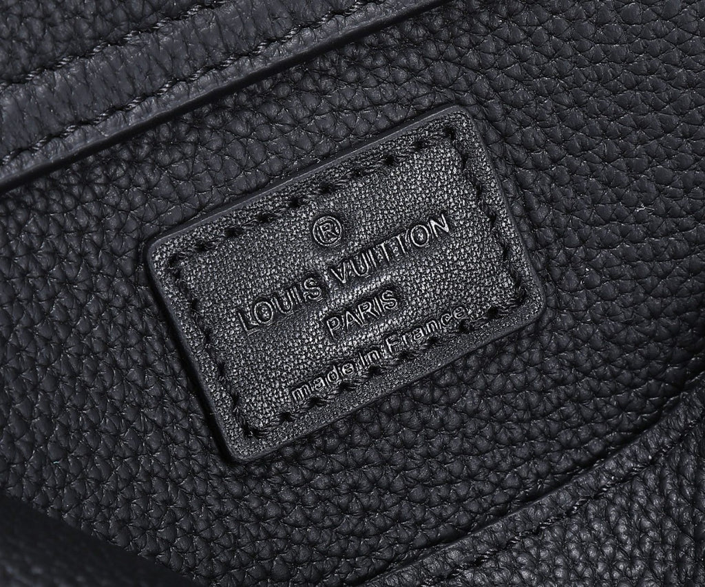 Black leather belt bag interior patch with Louis Vuitton Paris branding