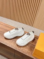 Louis Vuitton unisex sneakers pair in white leather with white laces and brown collar tabs