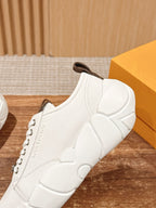 Louis Vuitton unisex sneaker side profile, white leather with brown lace stay detail
