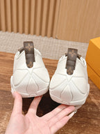 Louis Vuitton unisex sneakers back view, white leather with brown monogram heel tabs