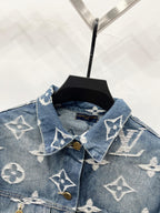 Blue denim jacket with white monogram, point collar and gold button placket