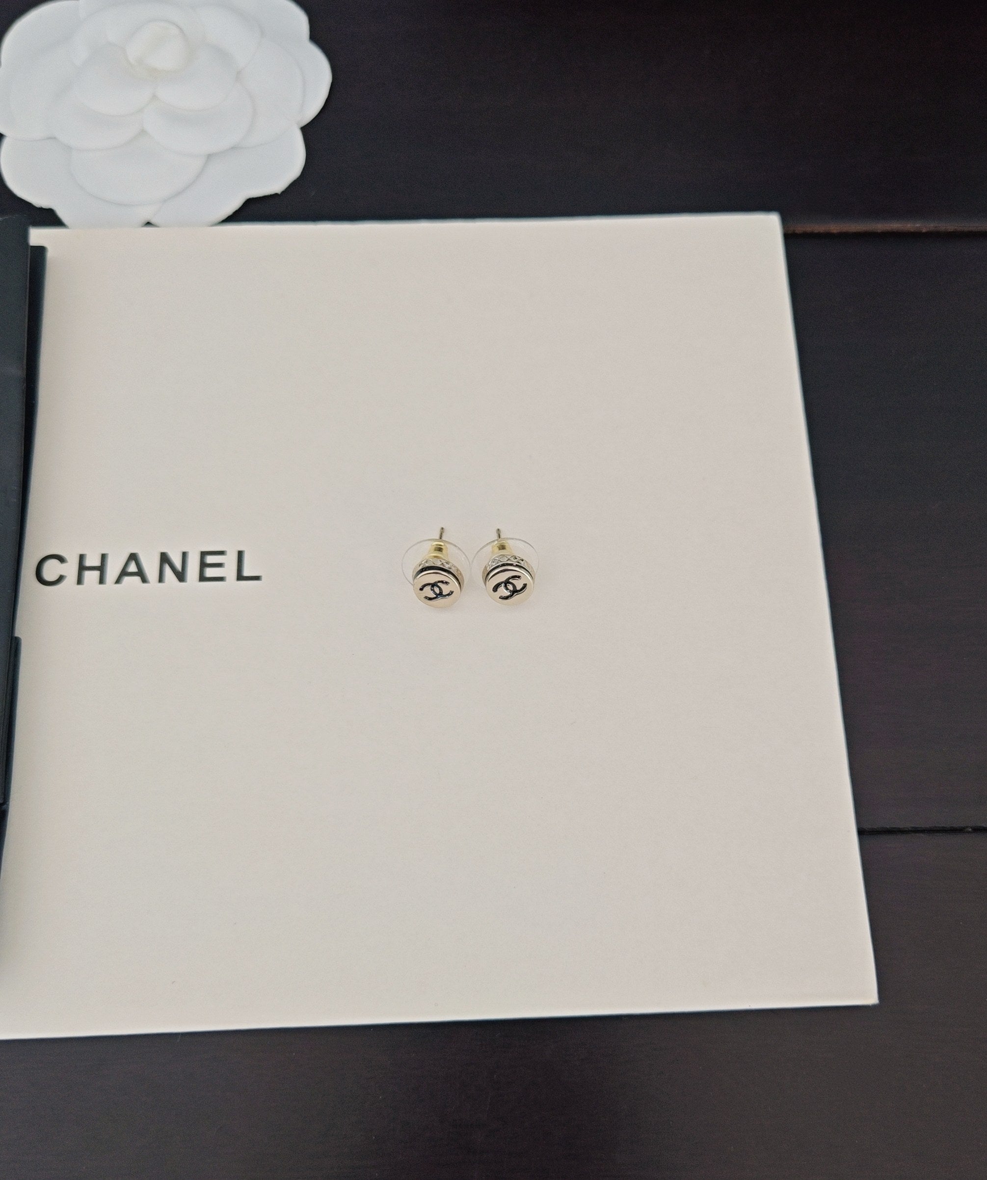Gold-tone Chanel CC stud earrings, small round discs with black logo