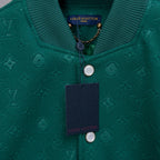 Long-sleeve jacket neckline with Louis Vuitton label, chain detail, and round snap hardware.