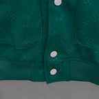 Long-sleeve jacket front, two chest snap buttons and dual side pockets on ribbed trim.