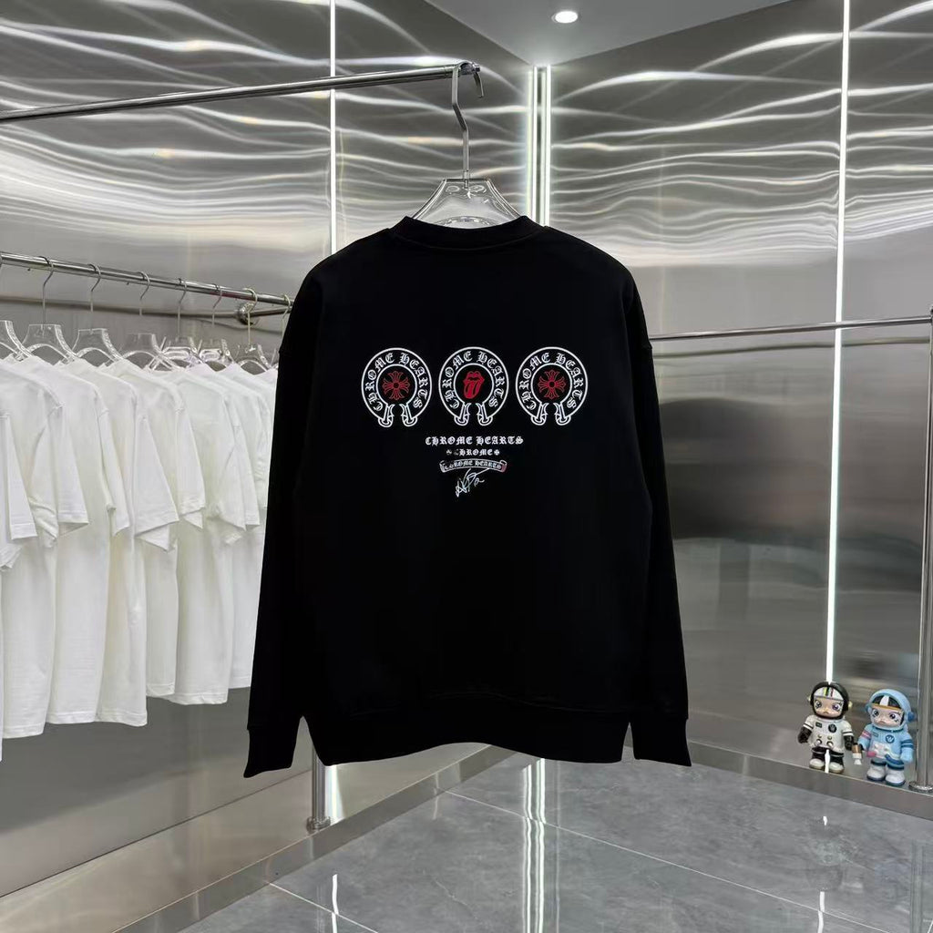 Black long-sleeve crewneck sweatshirt with large circular emblem graphic.