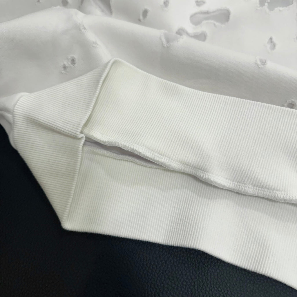 White Givenchy hoodie cuff and hem detail with ribbed trim