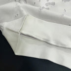 White Givenchy hoodie cuff and hem detail with ribbed trim