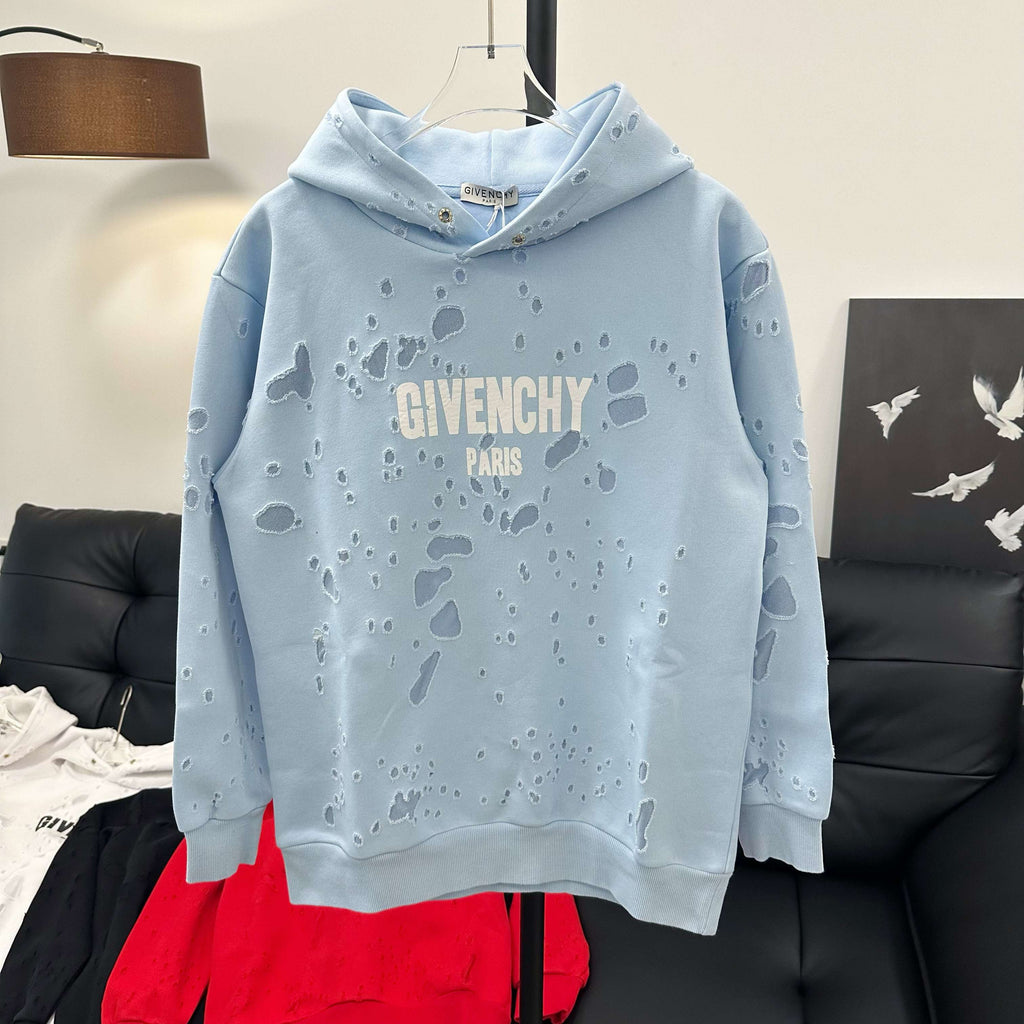 Light blue hoodie with hood, logo 'GIVENCHY PARIS' and paw-print pattern