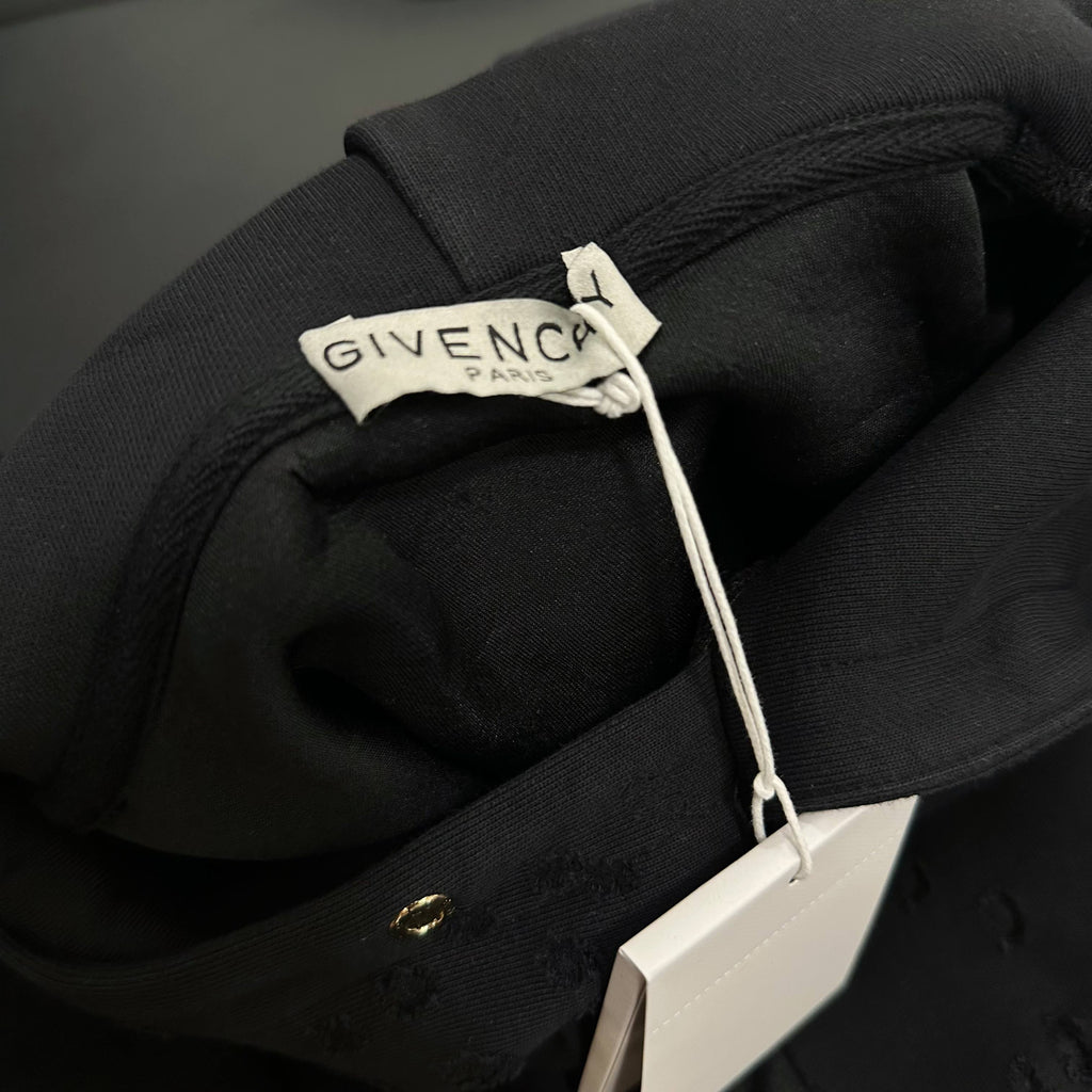Black hoodie with Givenchy Paris neck label and hood pull cords
