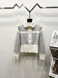 White Dior zip jacket with stand collar and repeating monogram pattern