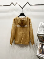 Tan hooded zip sweatshirt with Dior text print on back