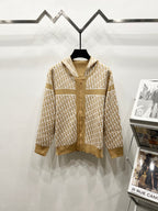 Tan hooded zip sweatshirt with allover Dior logo print and ribbed hem