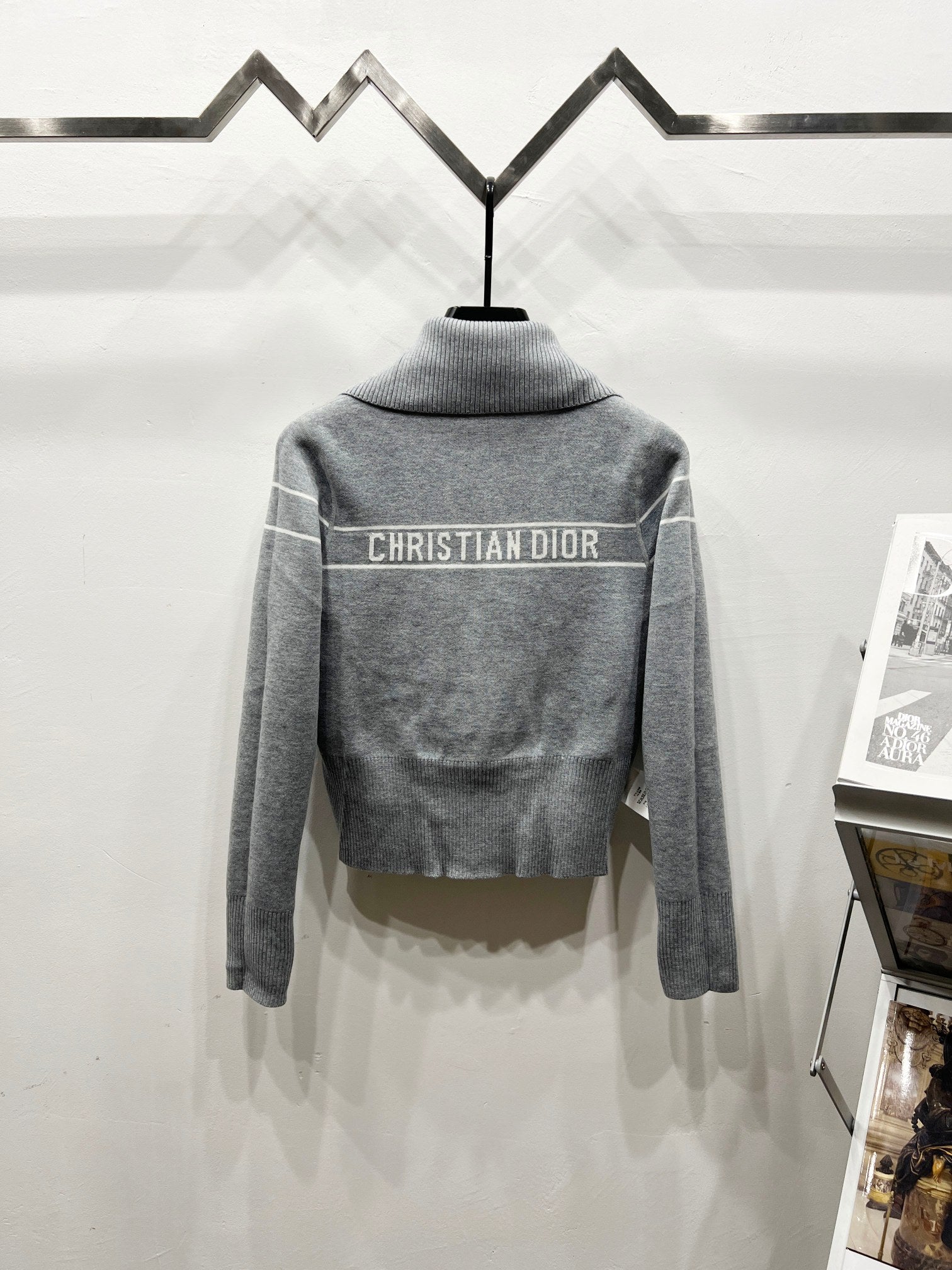 Gray long-sleeve knit sweater with high collar and Dior logo stripe on back
