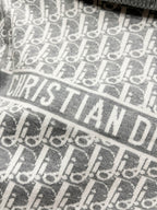 Dior monogram knit panel in gray and off-white with horizontal logo band