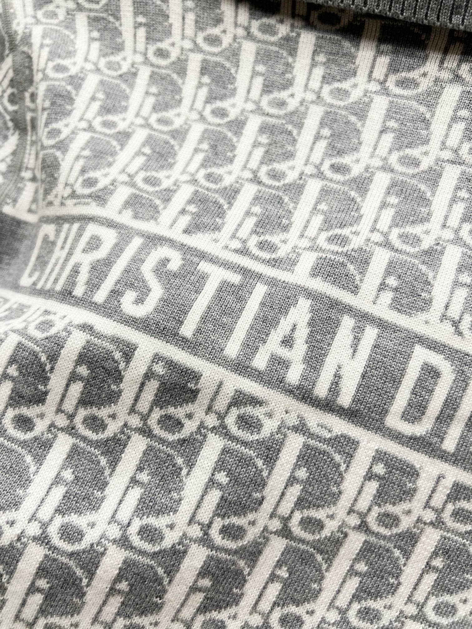 Dior monogram knit panel in gray and off-white with horizontal logo band