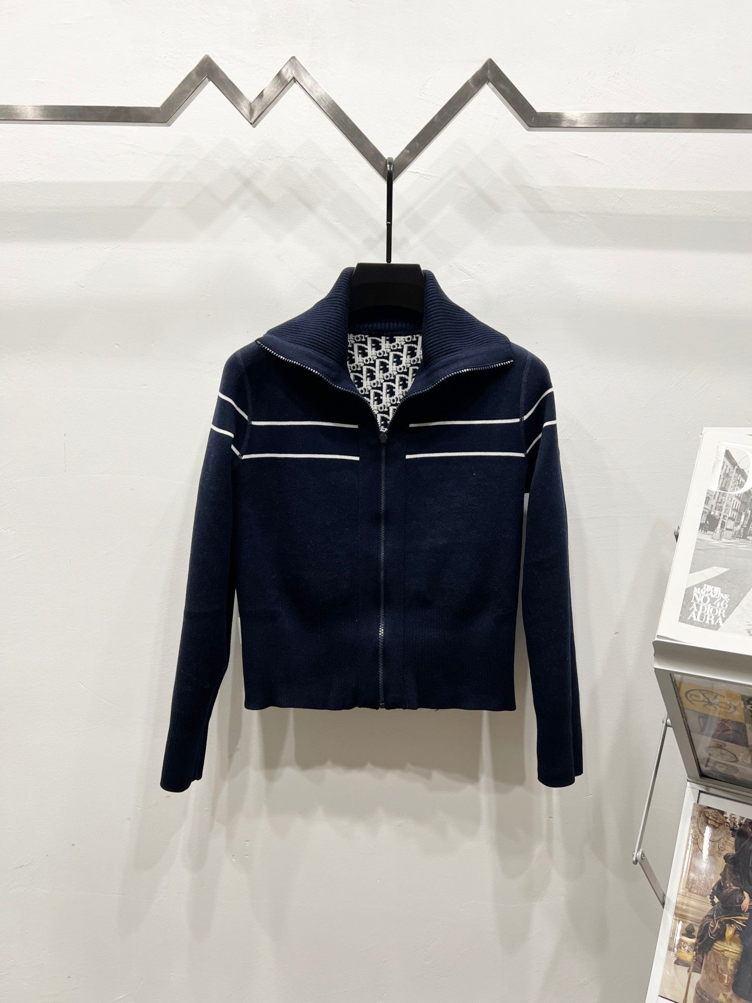 Navy long-sleeve zip jacket with stand collar and horizontal stripe details