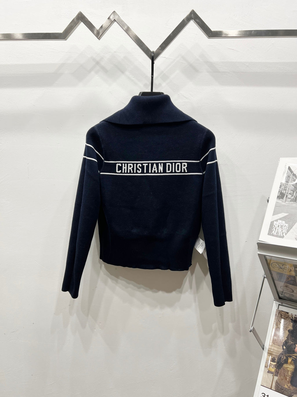 Back view navy long-sleeve zip jacket with stand collar and CHRISTIAN DIOR logo band