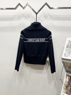 Back view navy long-sleeve zip jacket with stand collar and CHRISTIAN DIOR logo band