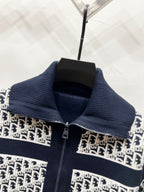 Long-sleeve zip jacket with stand collar, metal zipper, and logo-pattern panels