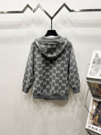 Grey zip-up hoodie with hood, allover monogram pattern, back view