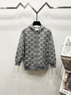 Grey long-sleeve zip-up hoodie with hood and full GG-style monogram pattern
