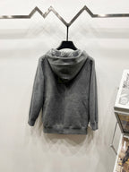 Grey zip-up hoodie with hood, full monogram pattern, back view