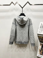 Gray hooded full-zip jacket, back logo text with repeating monogram pattern