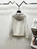 Dior long zip-up hoodie in cream, hooded back view with ribbed hem and cuffs