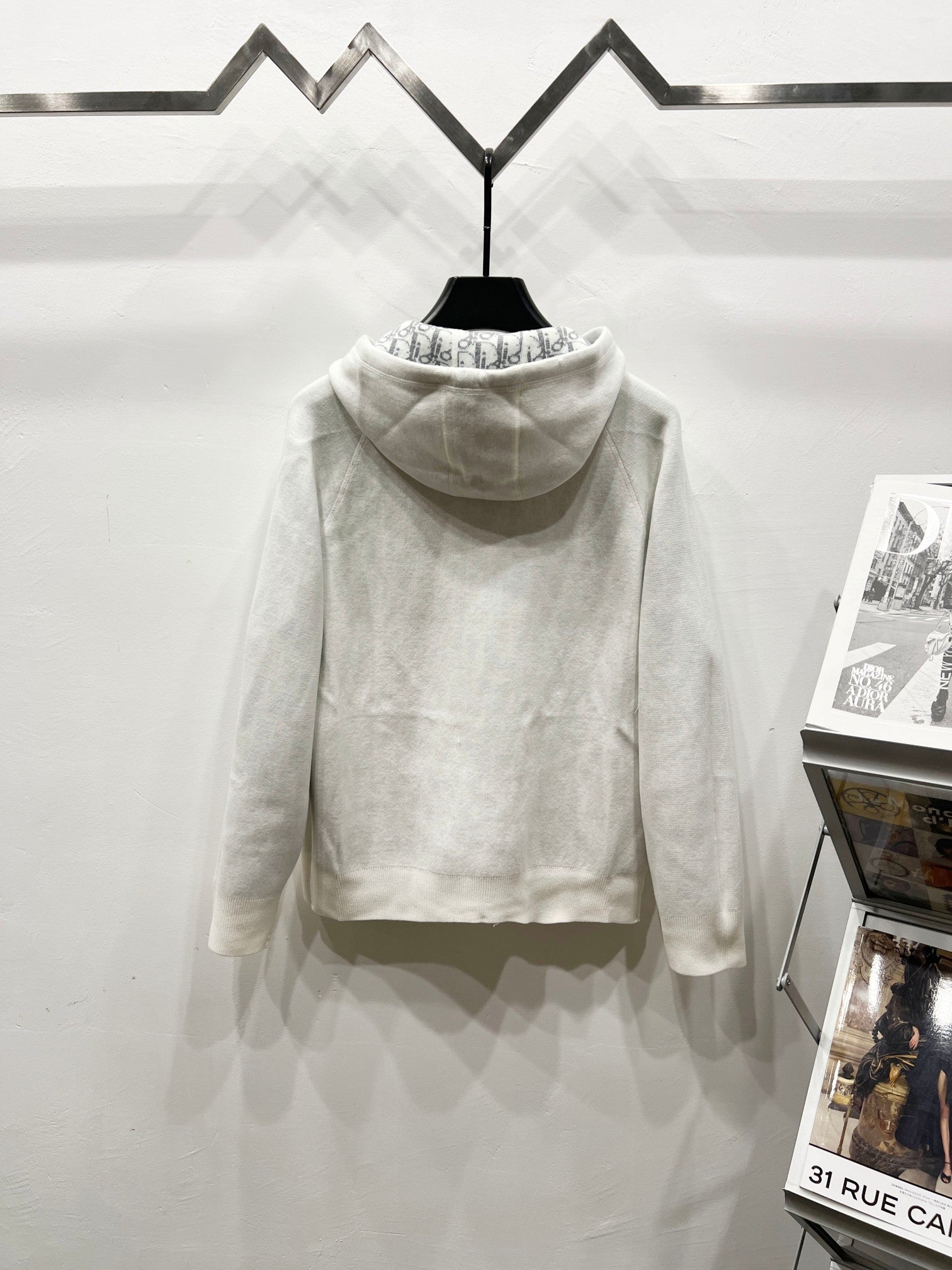 Dior long zip-up hoodie in cream, hooded back view with ribbed hem and cuffs