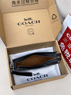 COACH zipper crossbody bag inside box, with strap and separate pouch