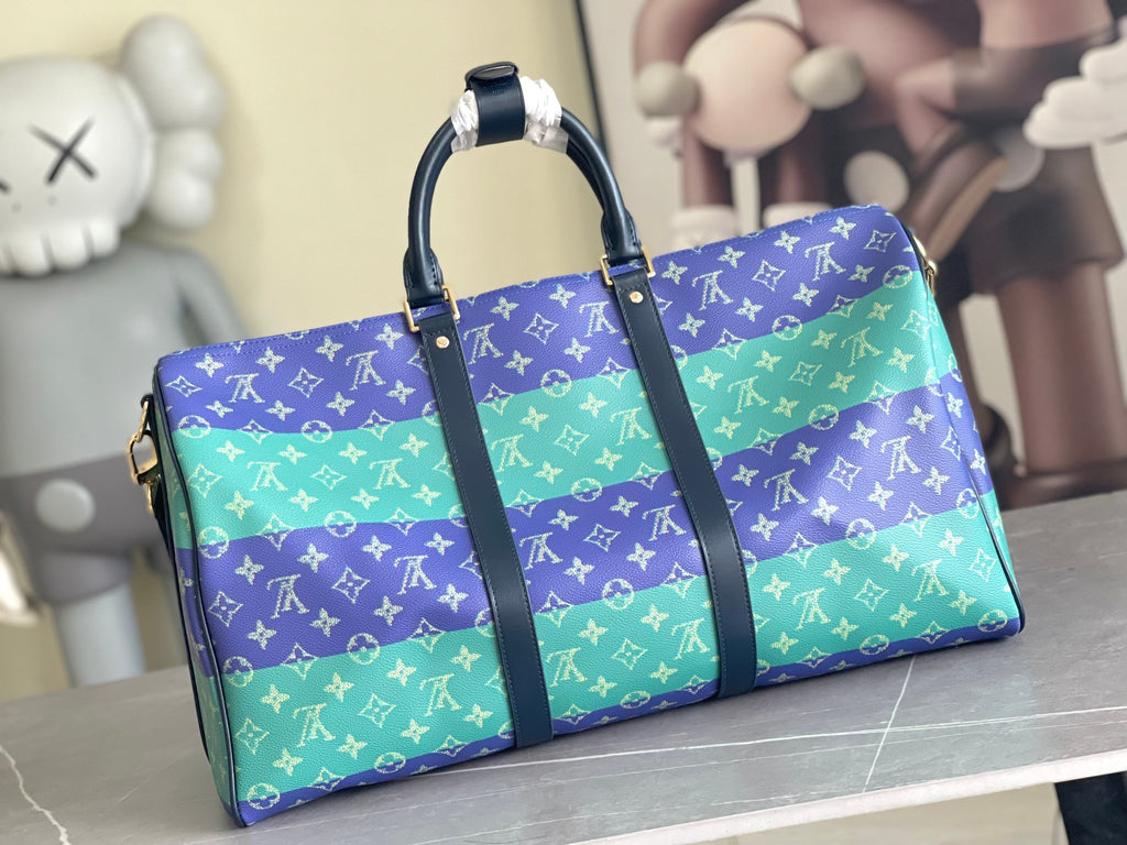 Louis Vuitton duffel bag with multicolor monogram, dark handles and side strap
