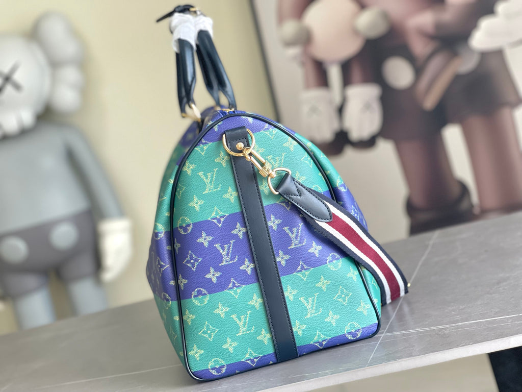Louis Vuitton duffel bag with blue and turquoise monogram, front view, crossbody strap