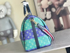 Louis Vuitton duffel bag with blue and turquoise monogram, front view, crossbody strap