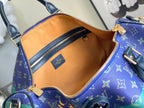 Louis Vuitton duffel bag interior with tan lining and zip pocket