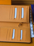 Small card holder interior with 6 card slots, blue insert tabs, gold hardware