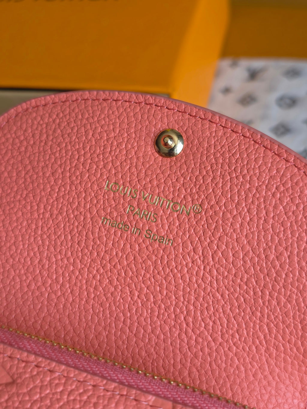 Louis Vuitton pink leather flap with gold snap and textured grain