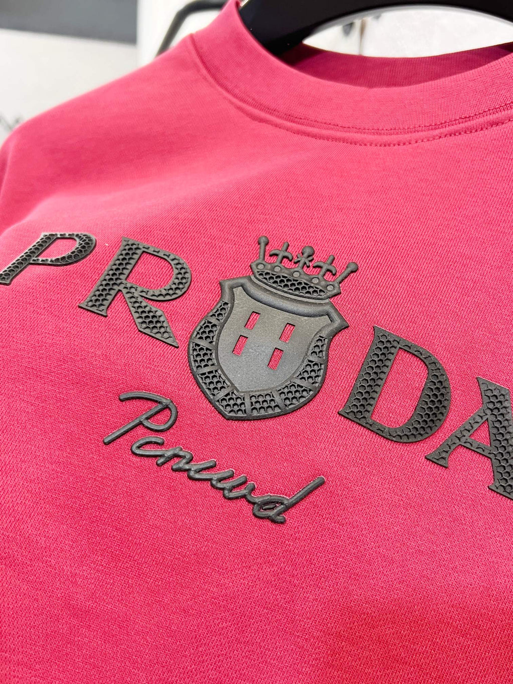 Pink sweatshirt with large embroidered PRADA crown and Prada script logo