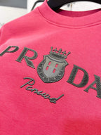 Pink sweatshirt with large embroidered PRADA crown and Prada script logo