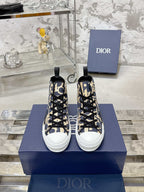 Dior unisex high-top sneakers in blue and beige with black laces, on box