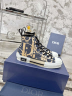 Dior unisex high-top sneakers in blue and beige with black laces, side view