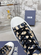 Dior unisex high-top sneaker close-up of toe and laces, blue and beige