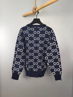 Navy knitted sweater with white GG logo all-over pattern, ribbed cuffs and hem