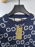 Navy GG logo knit sweater neckline with Gucci label tag