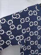 Navy GG logo knitted sweater sleeve with ribbed cuff