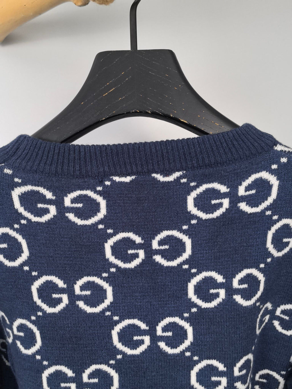 Navy knitted sweater crew neckline with repeating GG logo pattern