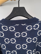 Navy knitted sweater crew neckline with repeating GG logo pattern