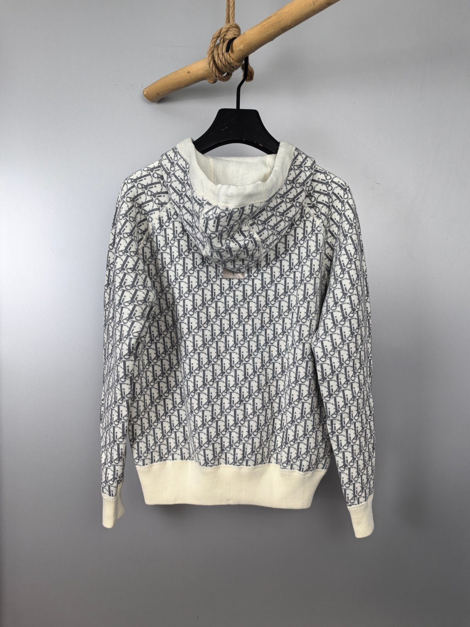 Monogram zip-up hoodie in white with ribbed hem and cuffs, front zipper
