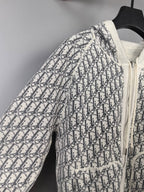 All-over monogram zip-up hoodie with hood and off-white trim, side view